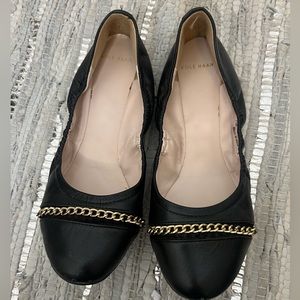 Black leather ballet flats
